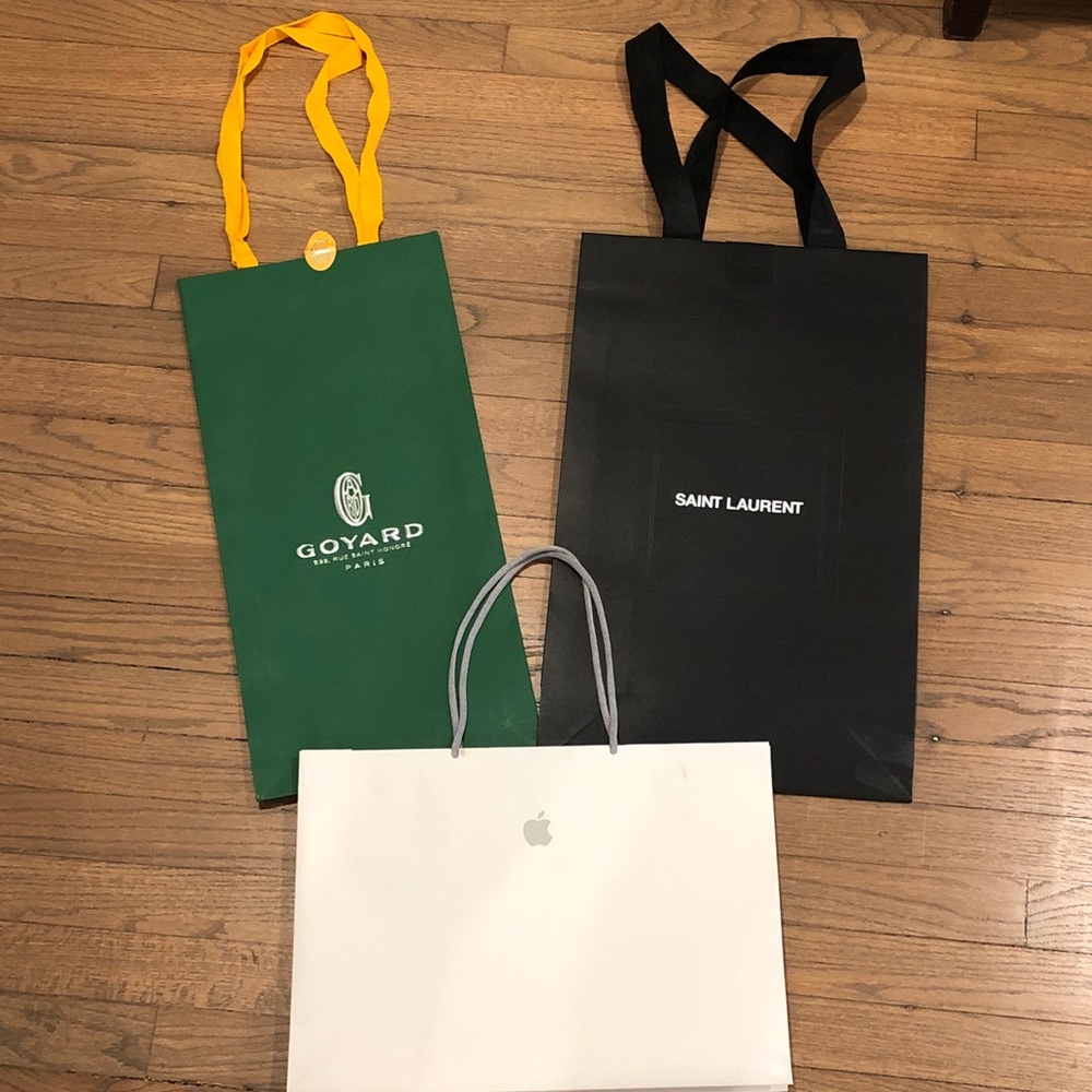 Lot of Goyard, Saint Laurent, and Apple Designer Shopping Bags